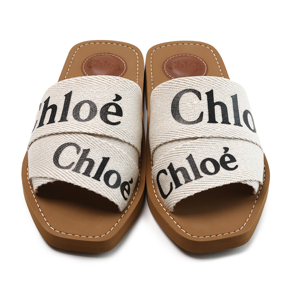 끌로에 샌들 우디 플랫 뮬 화이트 CHC22U188Z3 101